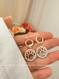 ARETES HUELLA DE PERRO