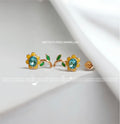 ARETES FLORES AMARILLAS